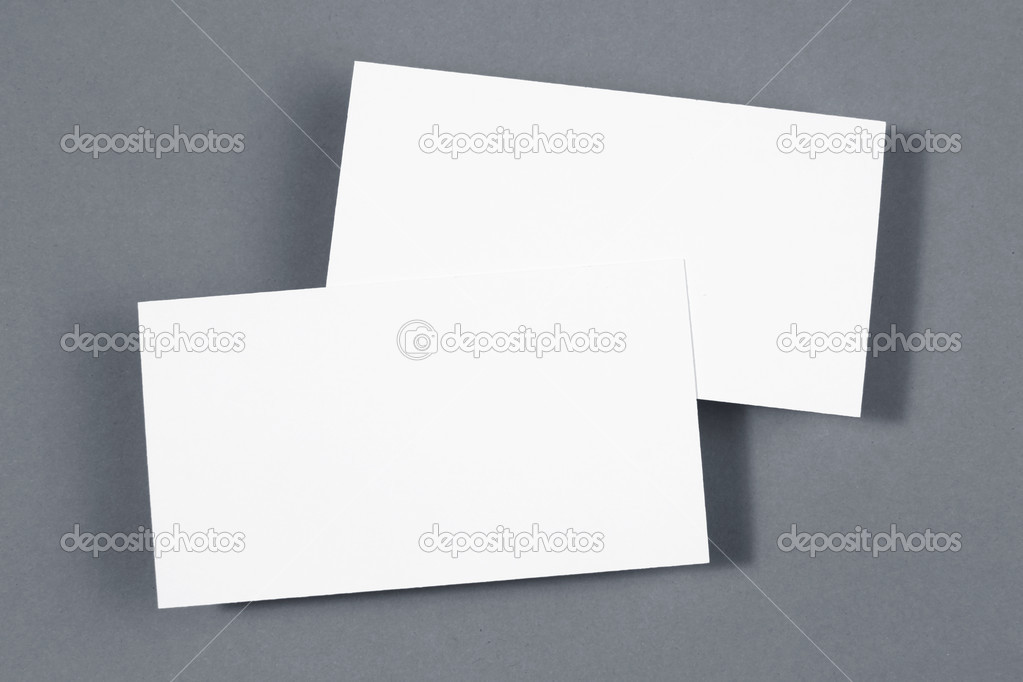 Two business card on grey paper background