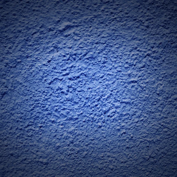 Blauwe abstracte achtergrond met lichte center spotlight en zwart — Stockfoto
