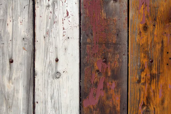 Four old wooden boards with peeling paint — Stock Photo, Image