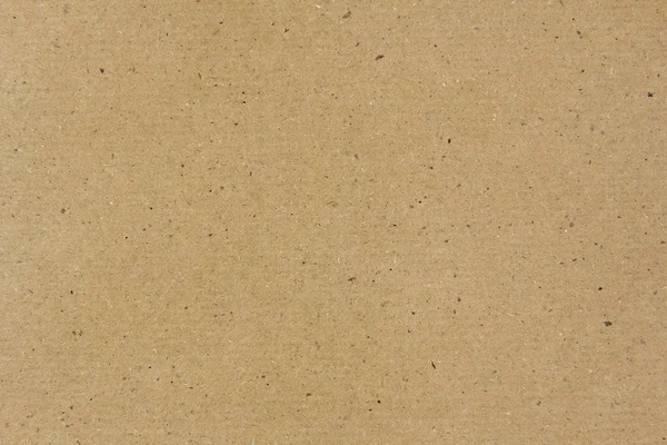Желтая бумага или картонный фон — стоковое фото