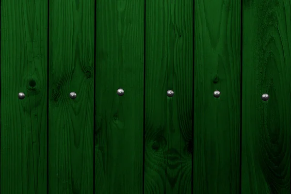 Zwarte groene muur met nagels — Stockfoto