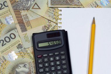 Lehçe para kağıt kalem ve hesap makinesi