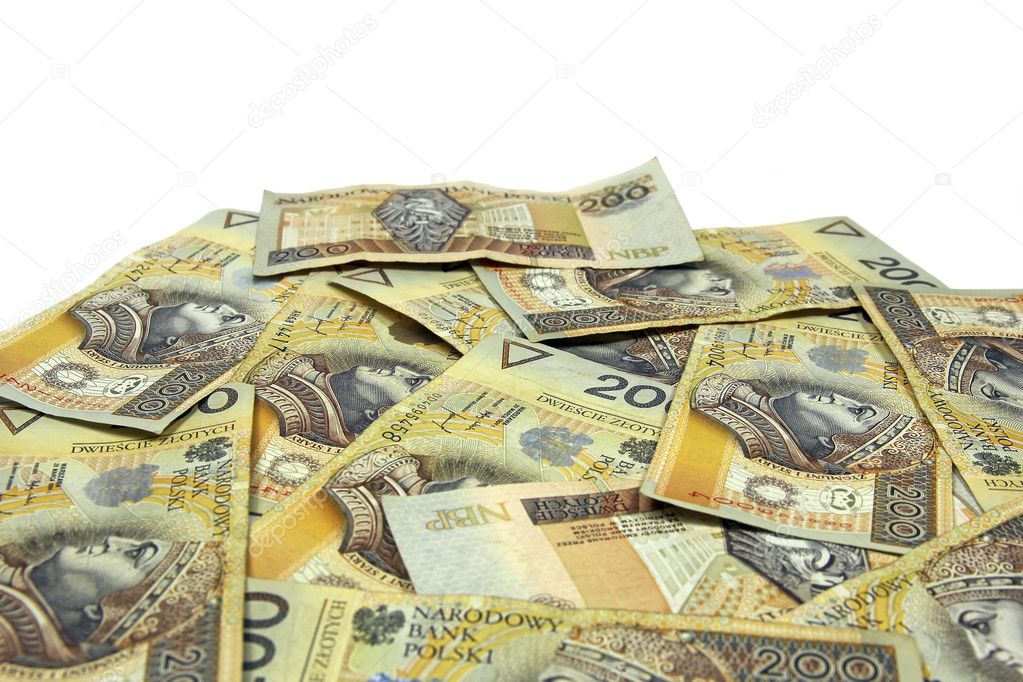Stack of polish zloty banknotes with white background