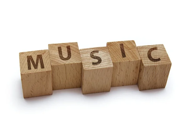 Wood blocks with music word on white background — Stock Photo, Image