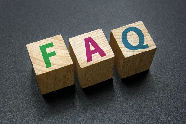 FAQ tekst op houten kubussen — Stockfoto