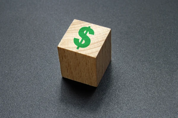 Dollartecken på trä kub — Stockfoto