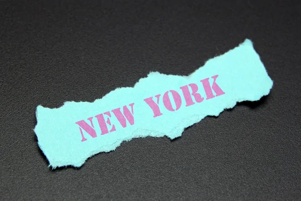 New York text on ripped paper — Stock Photo, Image