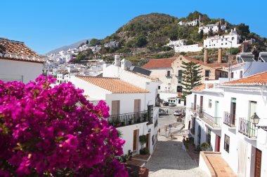 FRIGILIANA, MAY 12 panoramic view of Frigiliana on May 12, 2014 Frigiliana, Spain. It is one of beautiful white towns in Andalusia, Spain. clipart