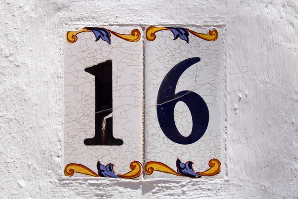 Spanish street number 16 — Stock Photo, Image