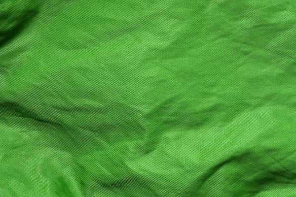 Green shiny cloth texture or background — Stock Photo, Image