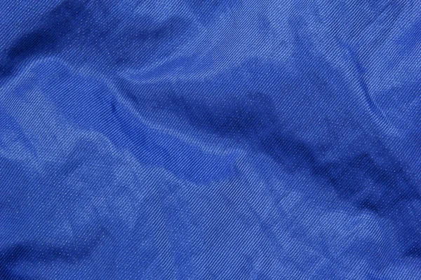 Primo piano della texture in tessuto blu lucido — Foto Stock