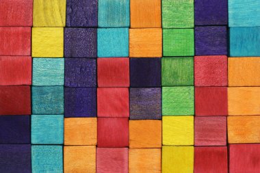 Colorful wood blocks background or texture clipart