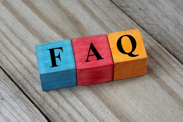 Concept of FAQ word on wooden colorful cubes — Stock Photo, Image