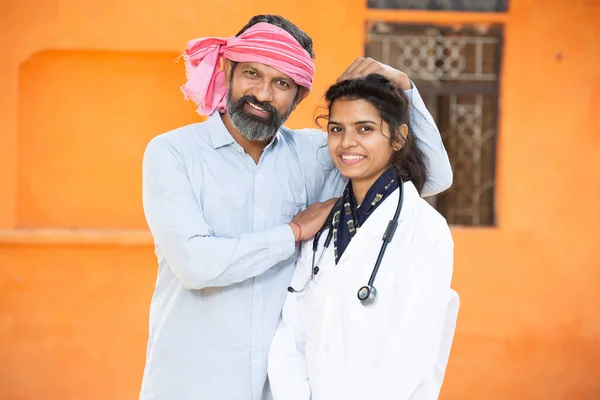 Portrait Happy Indian Farmer Father Support His Young Daughter Wearing Royalty Free Stock Photos