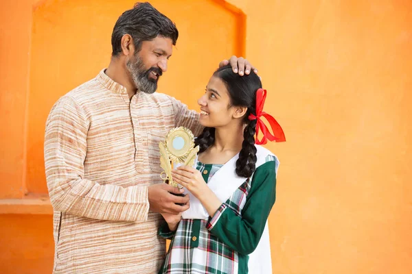 Young Happy Indian Daughter Her Father Holding Winning Prize Cheerful Royalty Free Stock Images