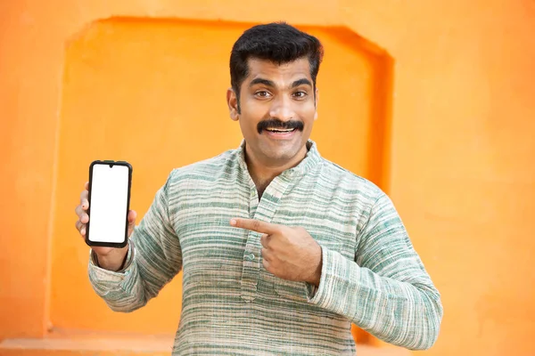 Cheerful Indian Young Mustache Man Showing Blank Phone Screen Excited Stock Image