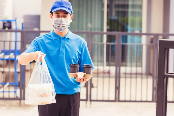 Asian Young Delivery Man Blue Uniform Wearing Face Mask Making — Stock Photo, Image