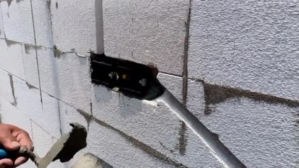 Installation Electrical Square Hole Block Outlets Switches Aerated Concrete Blocks — ストック動画