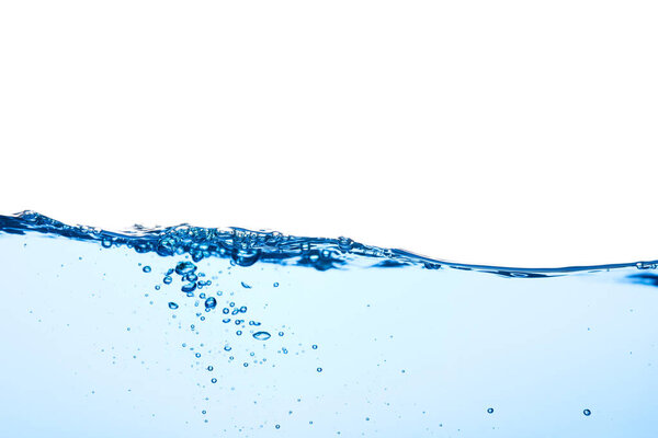 Light blue water wave with air bubbles and a little bit splashed underwater, studio shot isolated on white background. The abstract clean surface on liquid