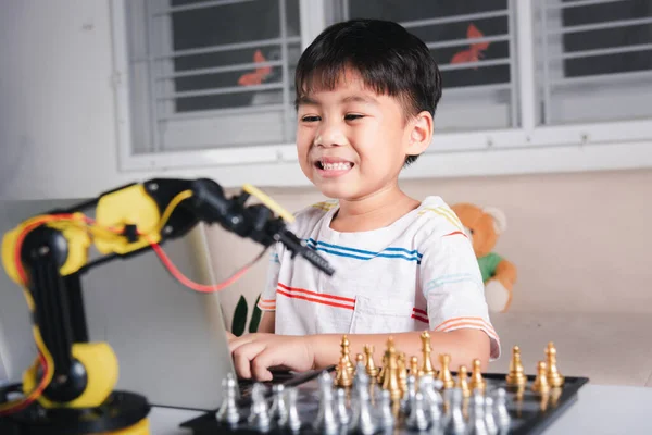 Asian Little Boy Programming Code Robot Arm Laptop Play Chess — 스톡 사진