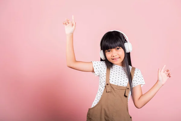 Asian Little Kid Years Old Smiling Listening Music Wearing Wireless —  Fotos de Stock