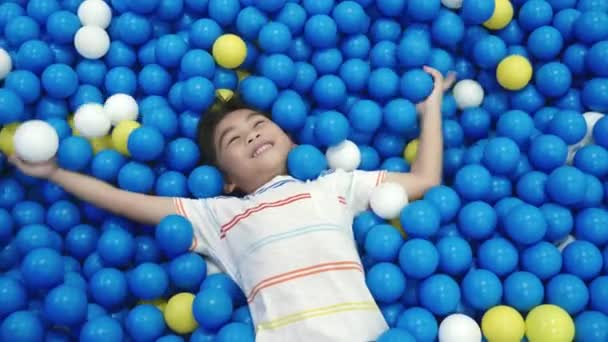 Happy Asian Child Man Having Fun Entertainment Center Inflatable Castle — Stock Video