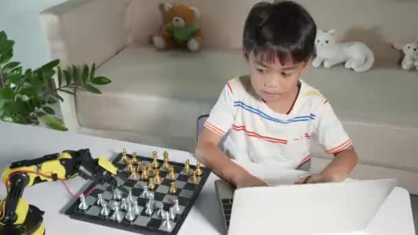 Asian Little Boy Programming Code Robot Machine Arm Laptop Play — Video Stock