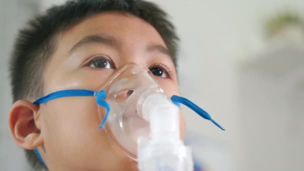 Asian Child Using Nebulizer Mask Equipment Alone Have Smoke Kid — Stock Video