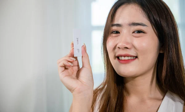 Close Woman Showing Rapid Antigen Test Kit Selftest Negative Result — Stockfoto