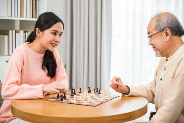 Beautiful Young Smile Woman Having Fun Sitting Playing Chess Game — Stockfoto
