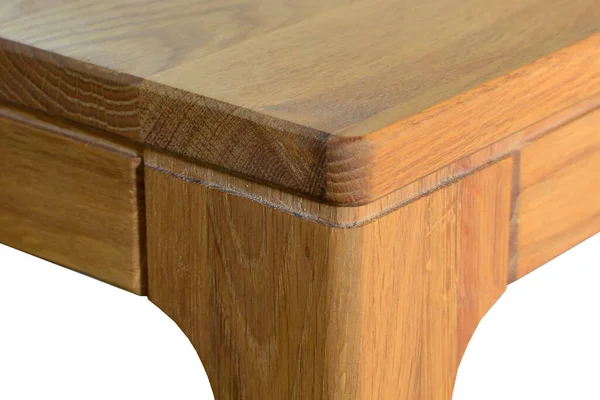 Wooden table surface. Natural wood eco furniture close view. Solid wood table top and legs