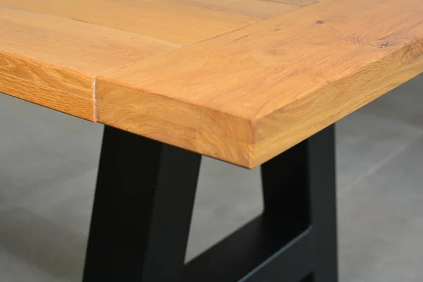 Wooden furniture surface. Natural wood close view photo background. Solid wood table top and legs. Eco furniture production, manufacturing concept