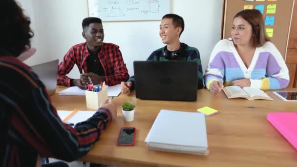 Young Multiracial Students Reading Books Using Laptop Classroom While Studying — Stock Video