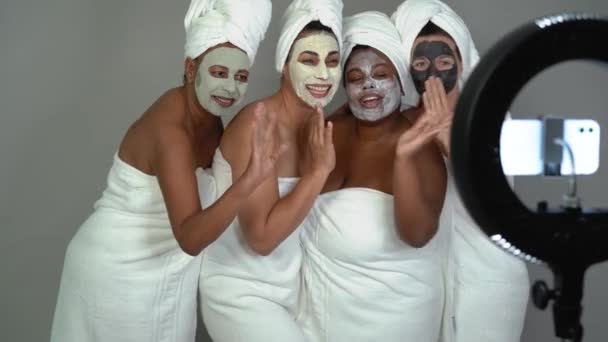 Happy Multiracial Females Having Skin Care Spa Day While Streaming — Stock Video