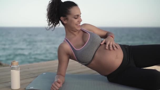 Happy Young Woman Caressing Her Pregnant Belly Next Sea Health — Stock Video