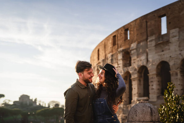 Young Romantic Couple Having Tender Moment Front Rome Colosseum Royalty Free Stock Images
