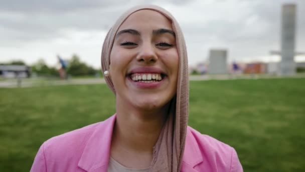 Happy Muslim Woman Having Fun While Posing Front Camera Park — Stockvideo