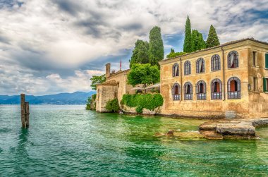 Lake Garda at Punta San Vigilio, Town of Garda, Italy clipart