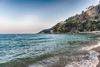 Landscape with a scenic sandy beach of Copanello on the ionian coastline in Calabria, Italy clipart