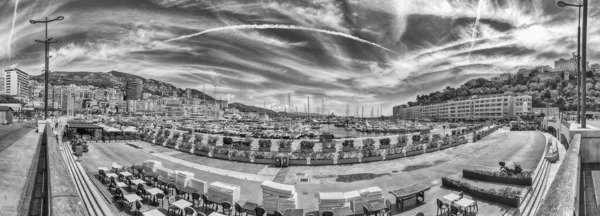 Panoramic view over luxury yachts and apartments of Port Hercules in La Condamine district, city centre and harbour of Monte Carlo, Cote d\'Azur, Monaco, iconic landmark of the French Riviera