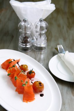 Fresh salmon with fresh cherry tomatoes
