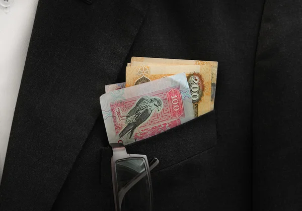 Dirhams in the pocket — Stock Photo, Image