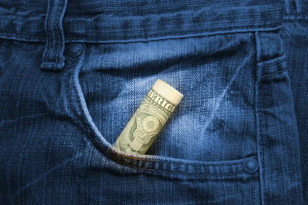 Conta de dólar rolou no bolso — Fotografia de Stock
