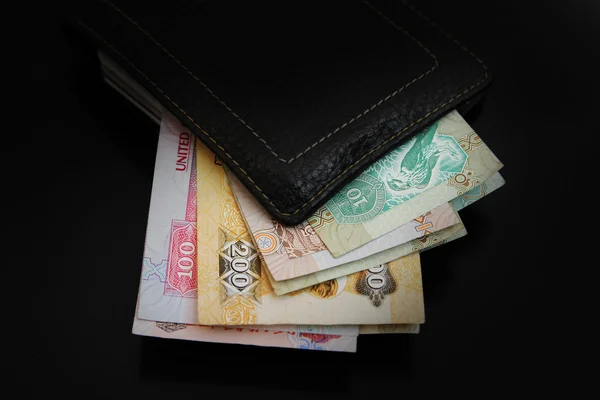 Dirham on wallet — Stock Photo, Image