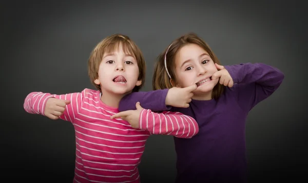 Children stupid faces — Stock Photo, Image