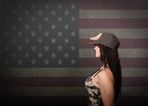 American soldier saluting the flag Stock Image