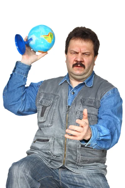 Man throwing globe — Stock Photo, Image