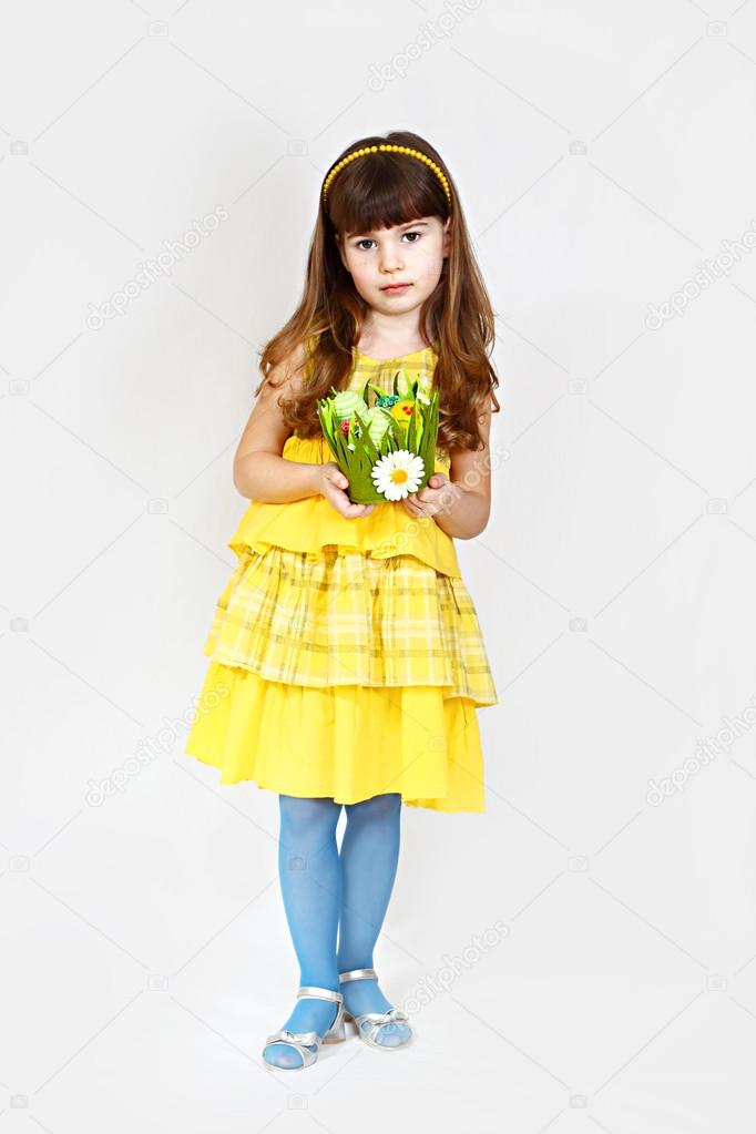 Cute girl in yellow