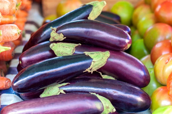 Group of aubergine on market — Stock Photo, Image