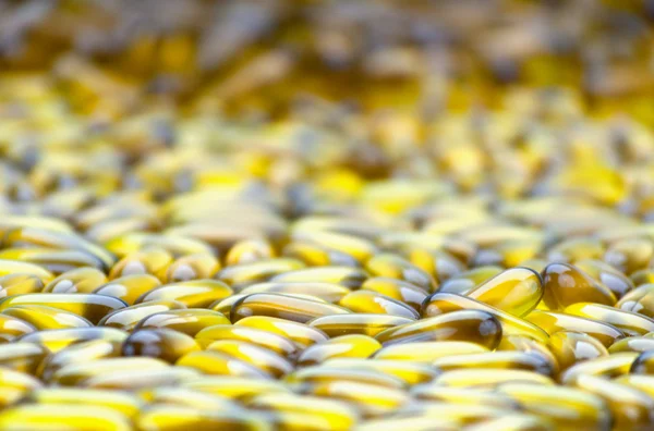 Closeup de grupo de cápsulas de óleo de coco Foco Seletivo — Fotografia de Stock